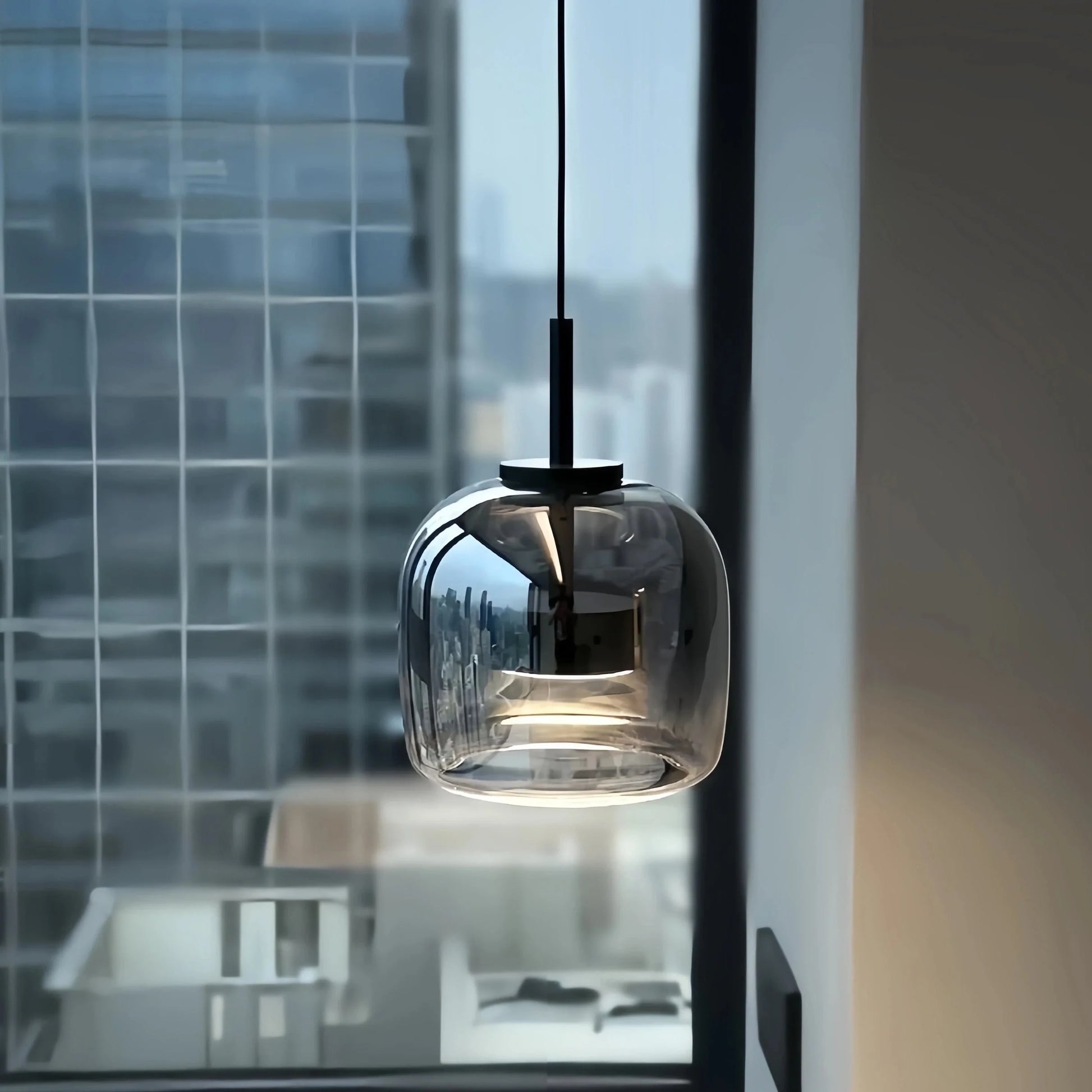 Black gold pendant lamp by Light My House featuring LED warm light and adjustable height for modern interior lighting.