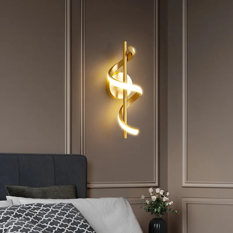 Twisted LED wall light in black and gold finish, modern design for living room decor, by Light My House.