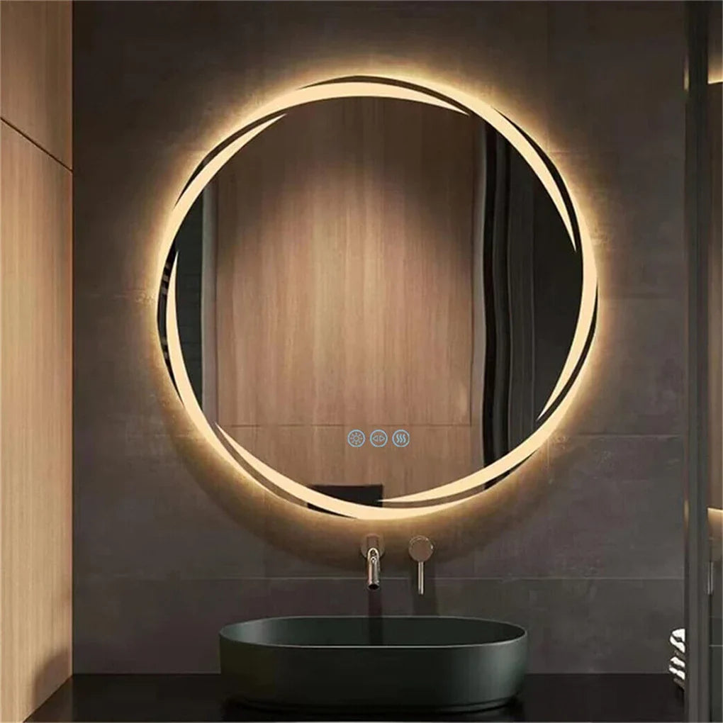 Round illuminated bathroom mirror with a dark sink below on a brown wall.