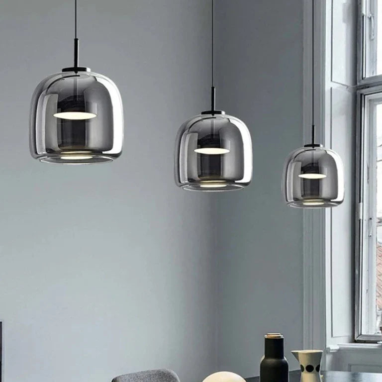 Black and gold pendant lamp with LED warm light, adjustable height, modern design, by Light My House.