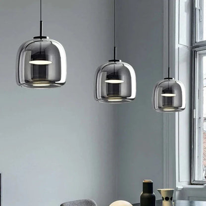 Black and gold pendant lamp with LED warm light, adjustable height, modern design, by Light My House.