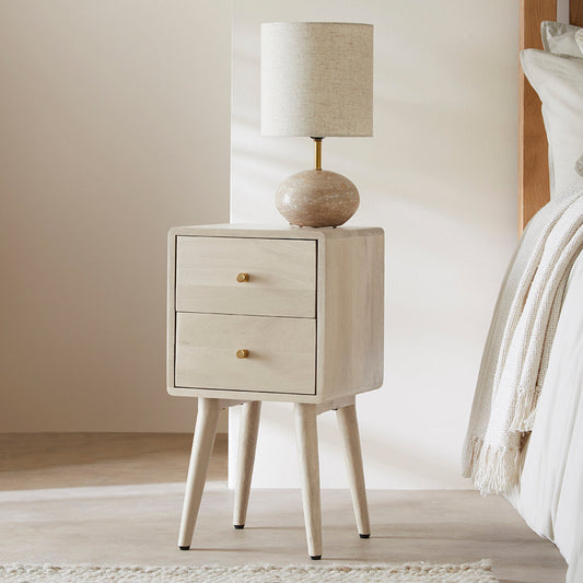 Minimalist white mango wood Logan narrow bedside table by Fishe and Lilly, featuring a sleek Scandinavian design and compact size.
