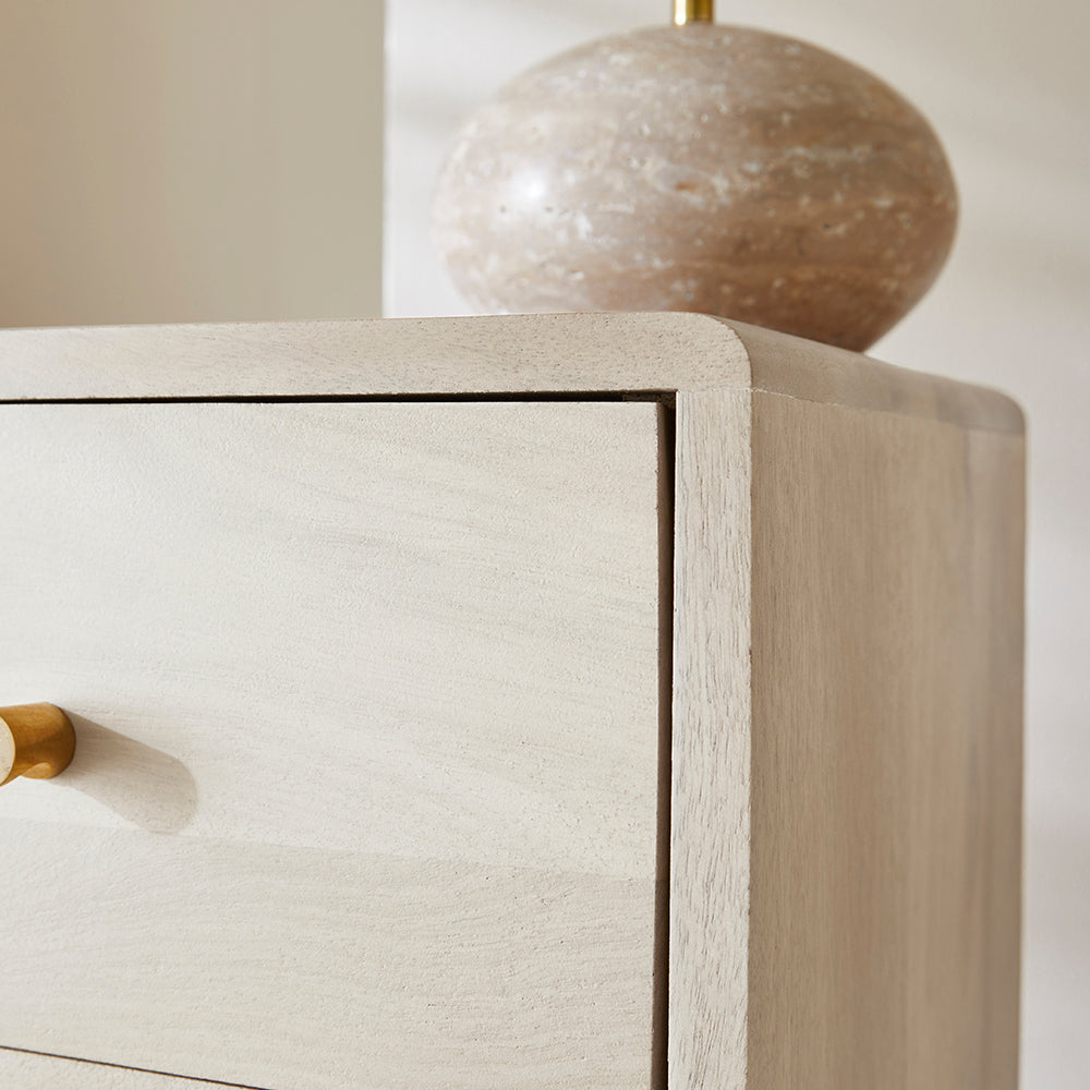 White minimalist mango wood Logan narrow bedside table by Fishe and Lilly with clean lines and compact design.