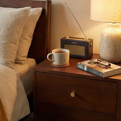 Walnut Oslo bedside table by Fishe and Lilly, featuring a sleek Scandinavian design with clean lines and a smooth finish.
