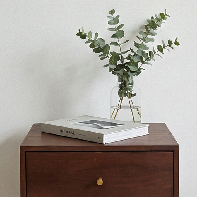 Scandinavian walnut Oslo bedside table by Fishe and Lilly, featuring a sleek modern design with clean lines and a natural wood finish.