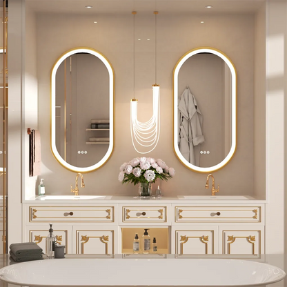 Bathroom vanity with illuminated mirrors and decorative elements.