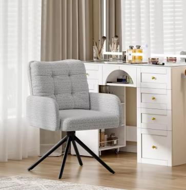Armchair with thick padded cushions - a stylish and comfortable accent chair for any bedroom or livingroom