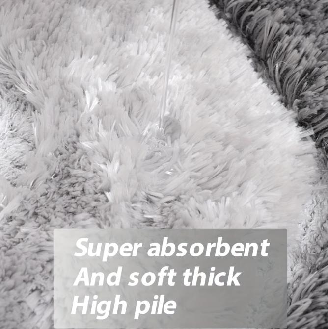 Two luxury chenille bathroom rugs from DEPOT, ultra soft and highly absorbent, shown in a bathroom setting.