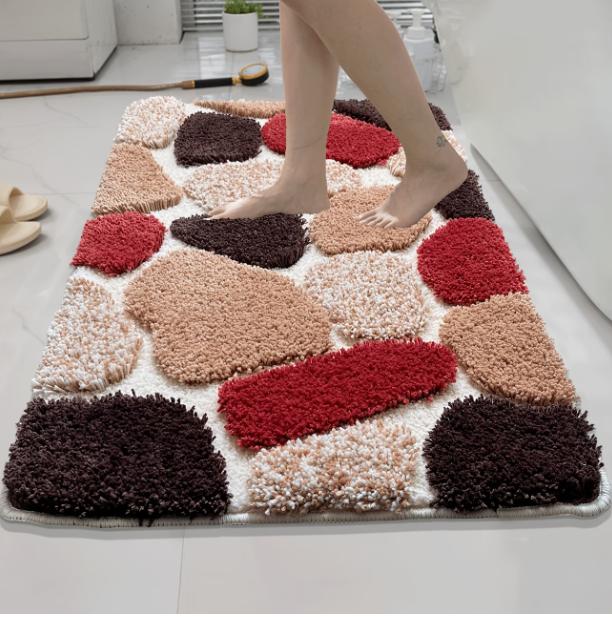 Soft pebble-style plush bath mat with non-slip rubber backing, machine washable bathroom rug by DEPOT.