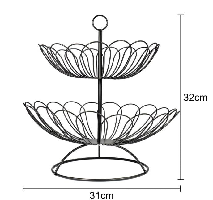 Stainless steel 2-tier fruit basket by DEPOT with durable metal construction, holding fresh fruit in a modern kitchen.