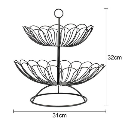 Stainless steel 2-tier fruit basket by DEPOT with durable metal construction, holding fresh fruit in a modern kitchen.