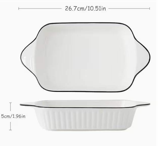 Three white ceramic baking dishes from DEPOT 3-piece set, showcasing smooth glazed surfaces and rectangular shapes for oven use.
