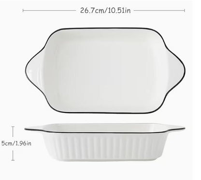 Three white ceramic baking dishes from DEPOT 3-piece set, showcasing smooth glazed surfaces and rectangular shapes for oven use.