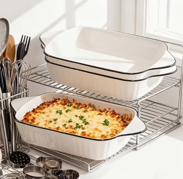 Set of three ceramic baking dishes by DEPOT, oval and rectangular shapes for oven cooking and baking.