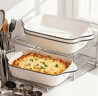 Set of three ceramic baking dishes by DEPOT, oval and rectangular shapes for oven cooking and baking.