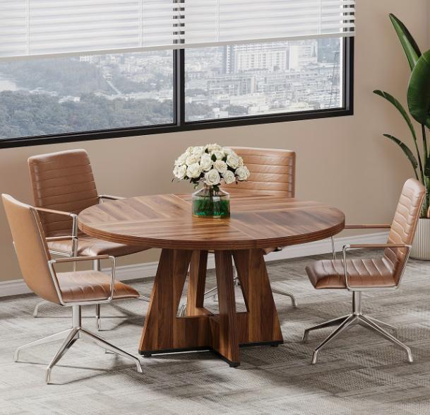 Round DEPOT dining table with wooden top and metal legs, suitable for kitchen, dining room, living room, or office use.