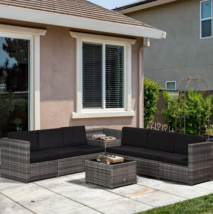 Outsunny 8-piece rattan garden furniture set with outdoor corner sofa and cushions, ideal for patio or backyard relaxation.