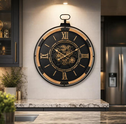 Maravi industrial extra large wall clock with black and gold finish, featuring bold cog design and vintage-inspired style.