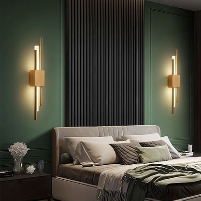 Modern black and gold LED wall lamp by Light My House, featuring warm lighting and a sleek hard-wired design.