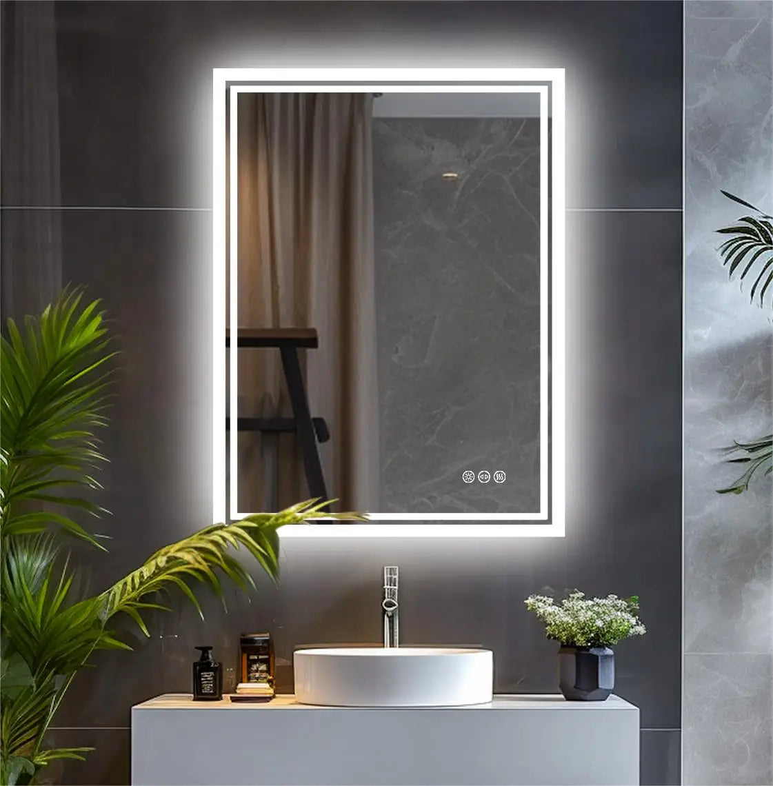 Bathroom with a illuminated mirror, sink, and decorative elements.