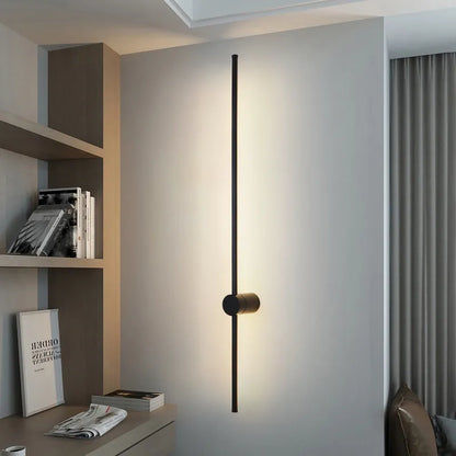 Black LED wall light by Light My House, modern warm bedroom lounge lamp with easy installation and sleek design.