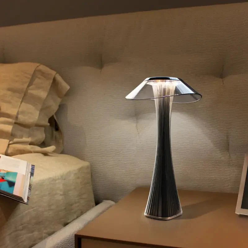 Hstrends Skyline rechargeable table lamp with modern design, featuring a sleek, curved silhouette and soft ambient lighting.