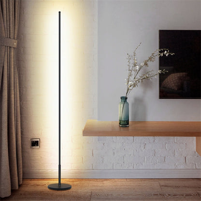 Mira Sales LED floor lamp with warm and white light, stepless dimming, minimalist design for bedroom or living room ambiance.