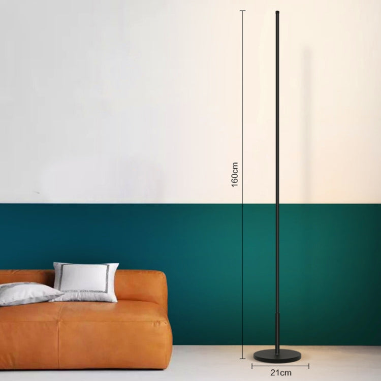 Mira Sales minimalist LED floor lamp with warm and white light, stepless dimming, ideal for bedroom or living room decor.