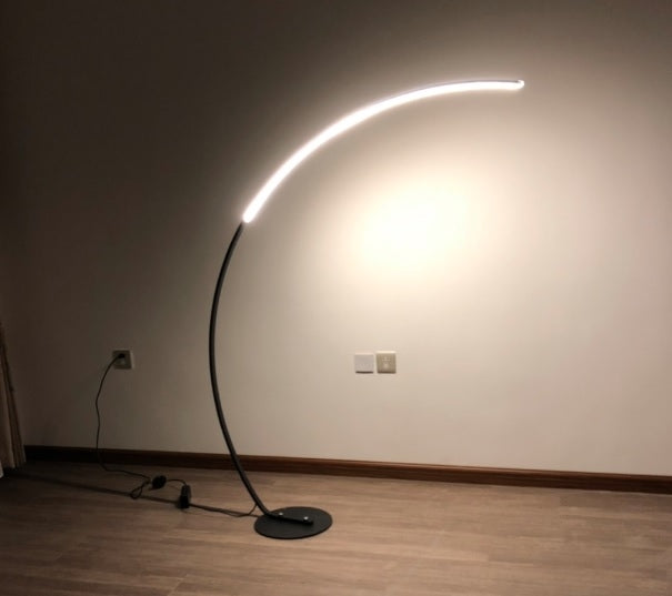 Modern Mira Sales fishing arc floor lamp with adjustable arm and remote control, perfect for reading and home decor.
