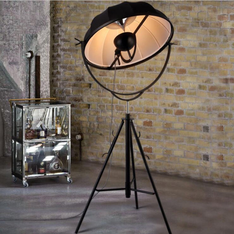 Industrial-style satellite studio tripod floor lamp by Mira Sales with adjustable spotlight for modern home and garden lighting.