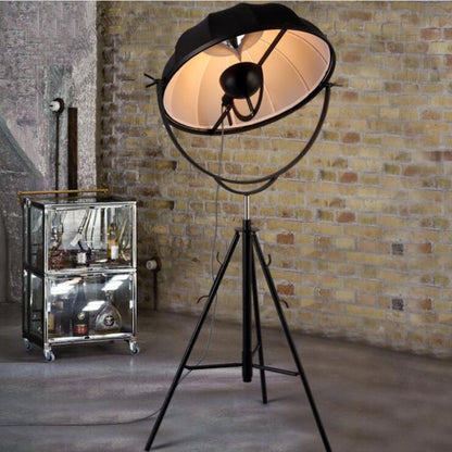 Industrial-style satellite studio tripod floor lamp by Mira Sales with adjustable spotlight for modern home and garden lighting.