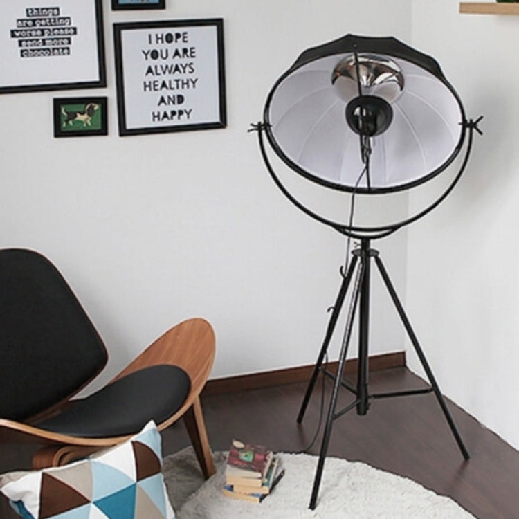 Industrial-style Satellite Studio Tripod Floor Lamp by Mira Sales with adjustable spotlight and modern standing design for home lighting.