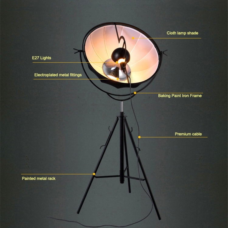 Industrial-style Satellite Studio Tripod Floor Lamp by Mira Sales with adjustable spotlight and modern standing design for home lighting.