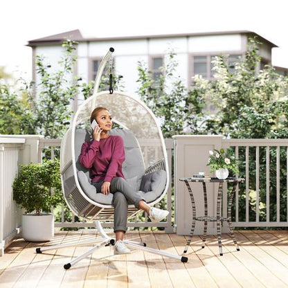 Outsunny hanging egg chair with stand and cushions, suitable for garden relaxation and outdoor use.
