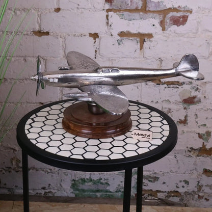 Vintage Spitfire model ornament by Maravi featuring a metal aircraft on a wooden base, detailed and decorative.