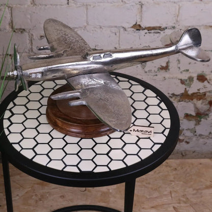 Vintage Spitfire model ornament by Maravi featuring metal aircraft on a wooden base, detailed and nostalgic display piece.
