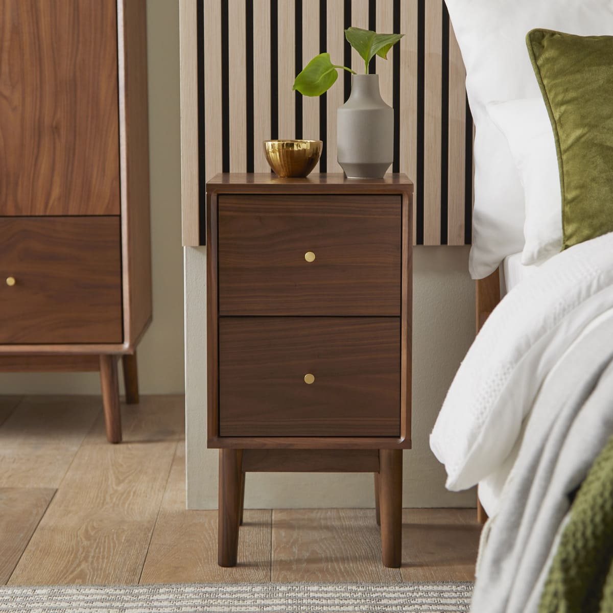 Fishe and Lilly Wright Narrow Walnut Bedside Table with a sleek rectangular design and smooth wood finish.