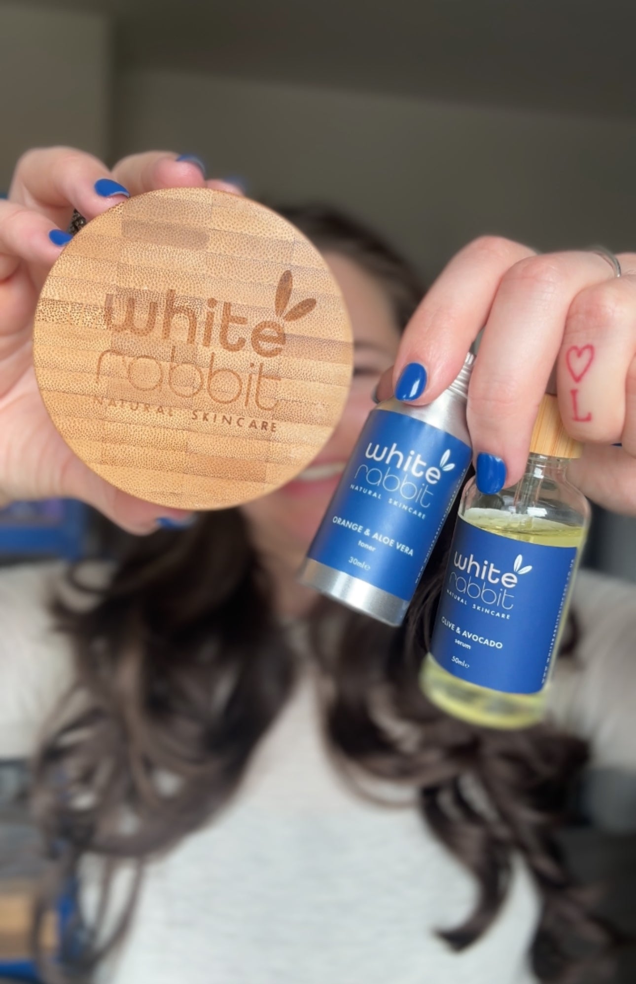 White Rabbit skincare bundle featuring natural, vegan, cruelty-free products with white rabbit-themed packaging and skincare products inside.
