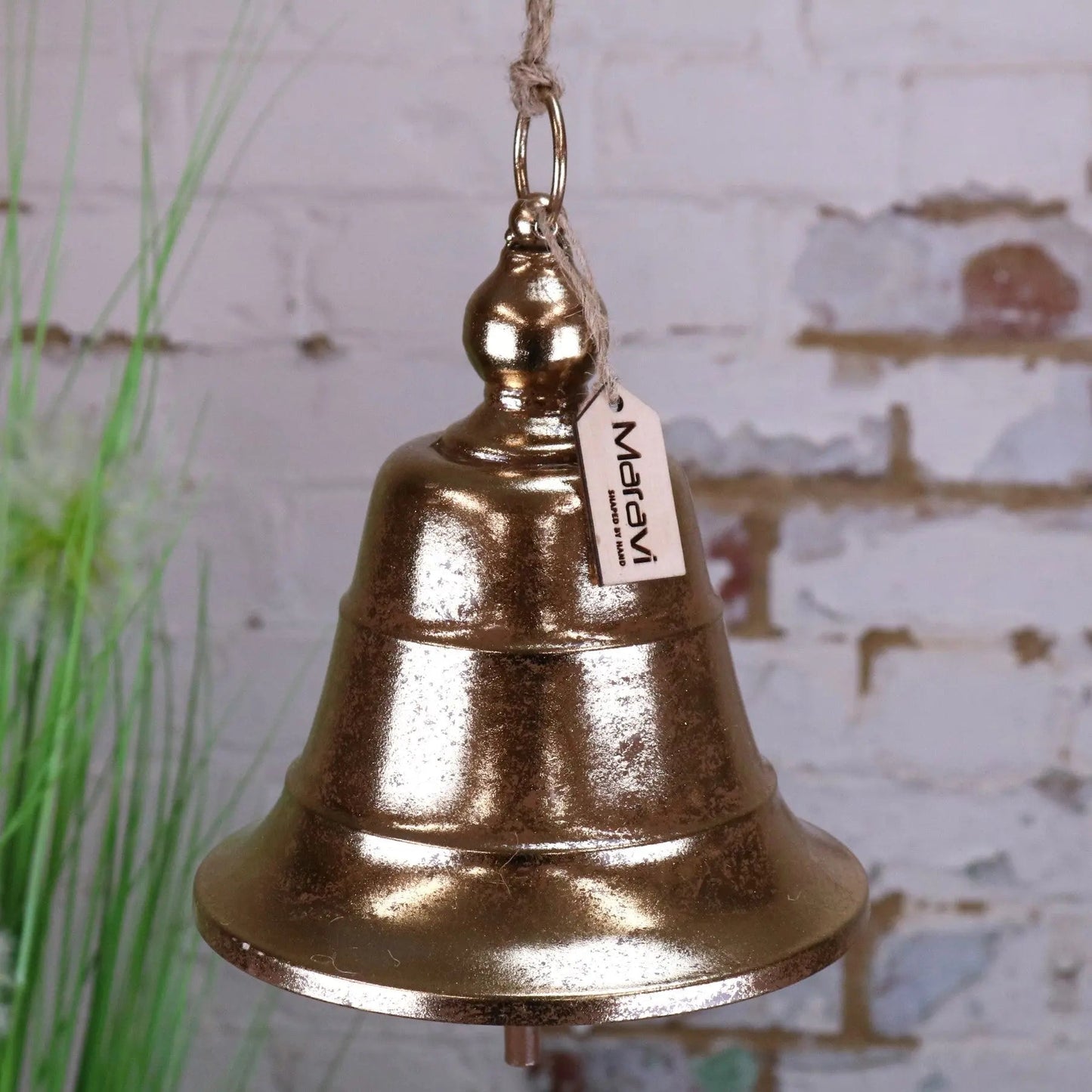 Gold Yanika hanging reception bell by Maravi, 20cm tall, with a shiny finish and decorative hanging design.