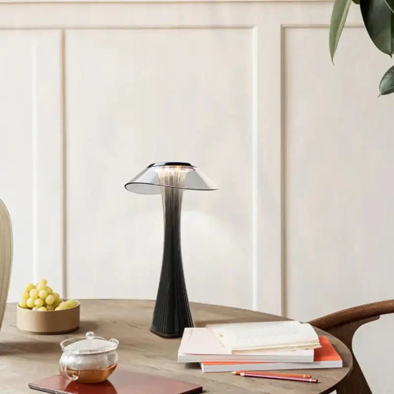 Hstrends Skyline Rechargeable Table Lamp with modern design, white finish, and adjustable brightness on a wooden desk.