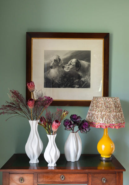 Tall white twisted ceramic vase from Casa by Josephine Jenno, featuring elegant design and smooth finish.