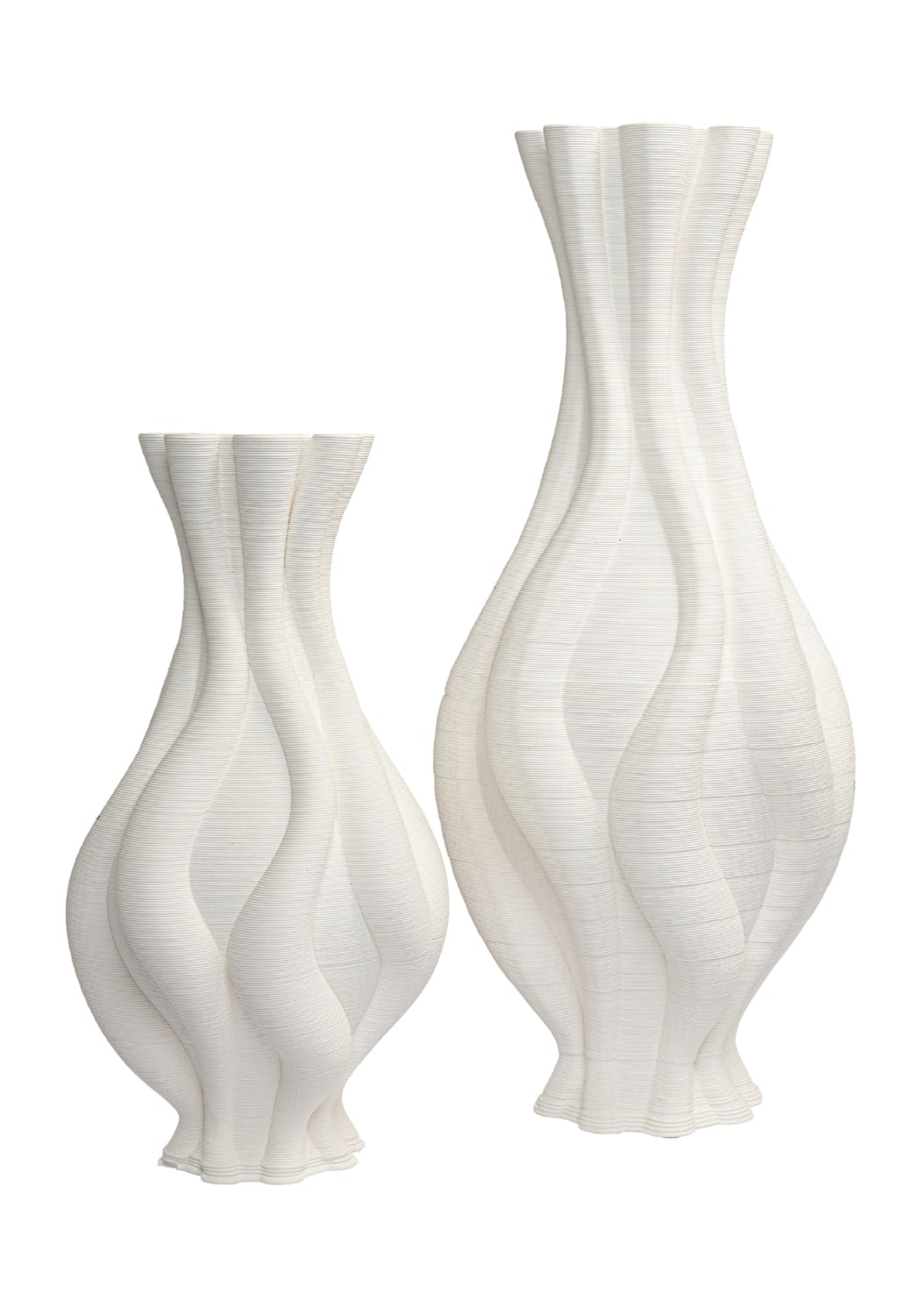 Tall white twisted ceramic vase from Casa by Josephine Jenno, showcasing its elegant, modern design and textured surface.
