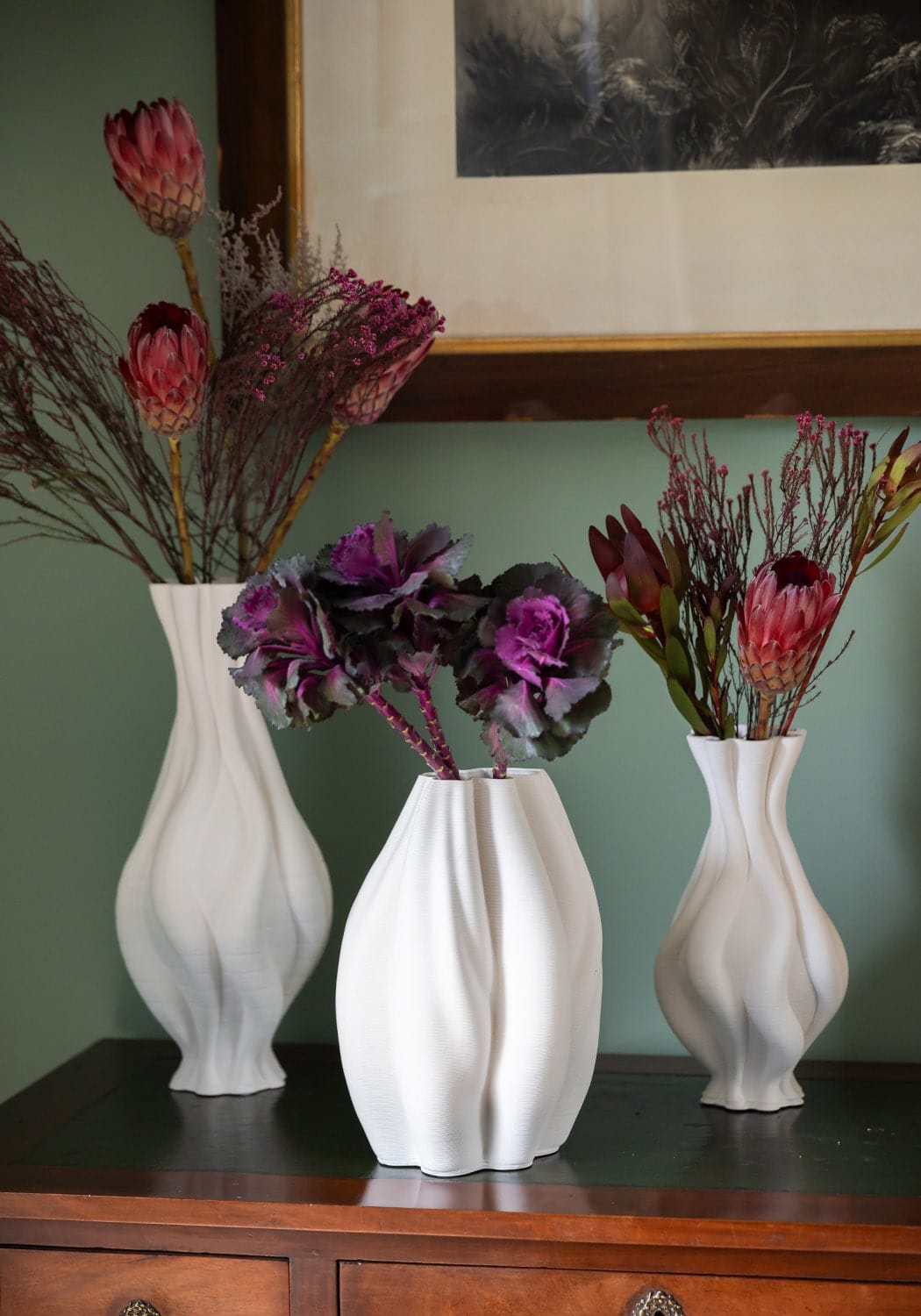 Tall white twisted ceramic vase from Casa by Josephine Jenno, elegant vase with a modern design and textured surface.
