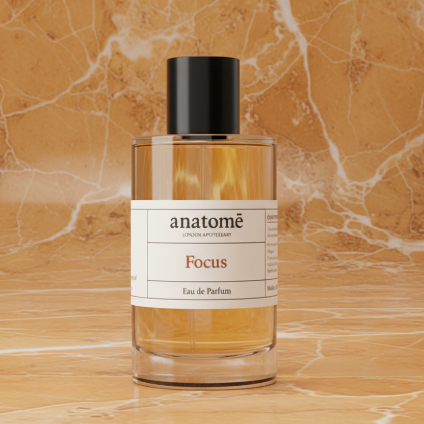 Focus Functional Perfume by anatomē, a sleek glass bottle with a minimalist design, showcasing the elegant perfume inside.