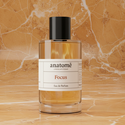 Focus Functional Perfume by anatomē, a sleek glass bottle with a minimalist design, showcasing the elegant perfume inside.