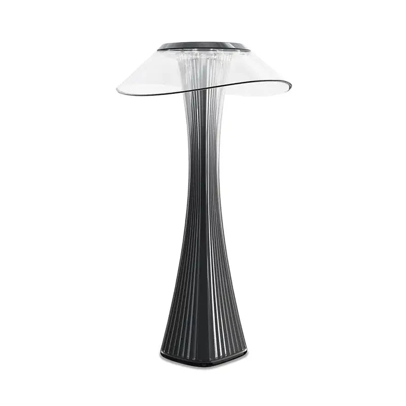 Hstrends Skyline rechargeable table lamp with modern design, illuminated with warm light on a sleek surface.