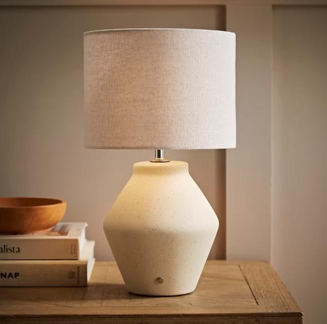 Finn ceramic rechargeable table lamp by TrendHomeDepot, showcasing its sleek design and ambient lighting in a modern setting.
