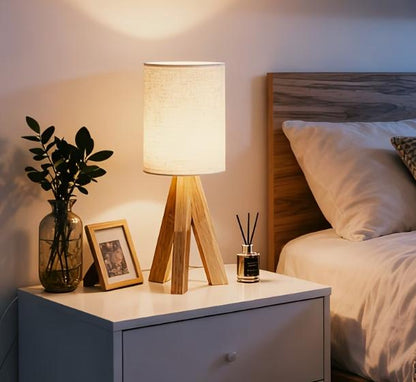 Wooden art table lamp by TrendHomeDepot with warm ambient lighting, modern design, and a sleek wooden base for contemporary interiors.