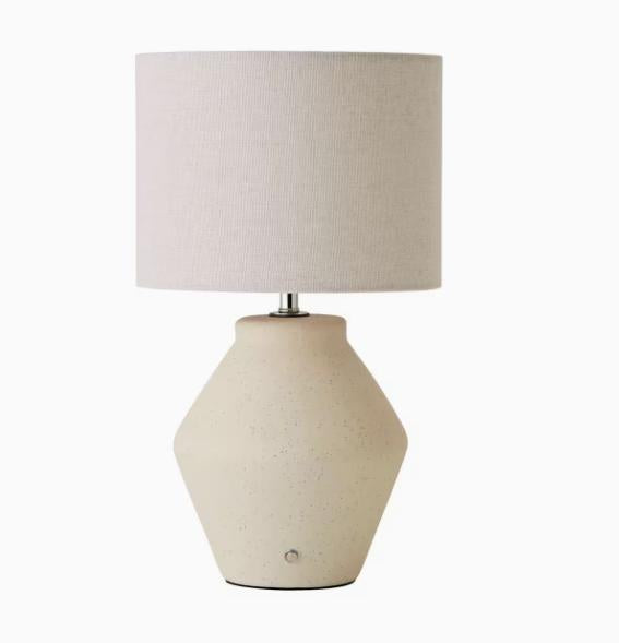 Finn ceramic rechargeable table lamp by TrendHomeDepot, portable wireless ambient lighting with a sleek, modern design.
