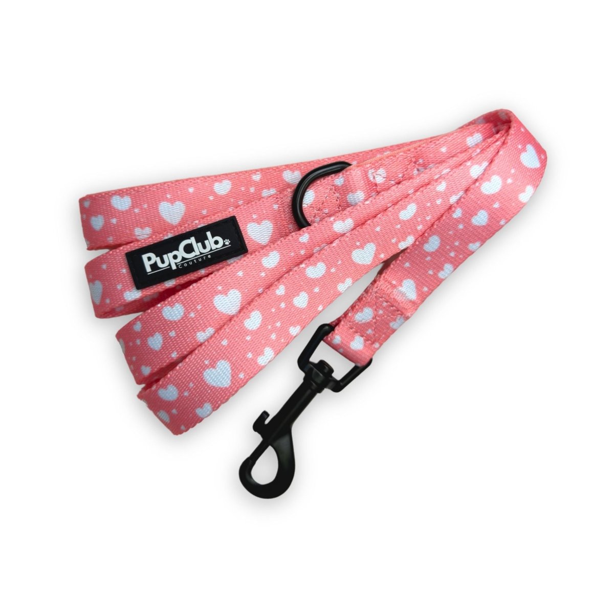Peach-colored dog lead with heart pattern by PupClub Couture, stylish and comfortable for everyday walks.